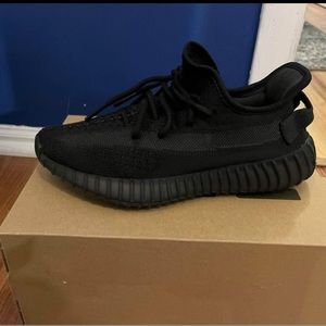 Black Yeezy’s. 7 woman. 5 1/2 men’s size.